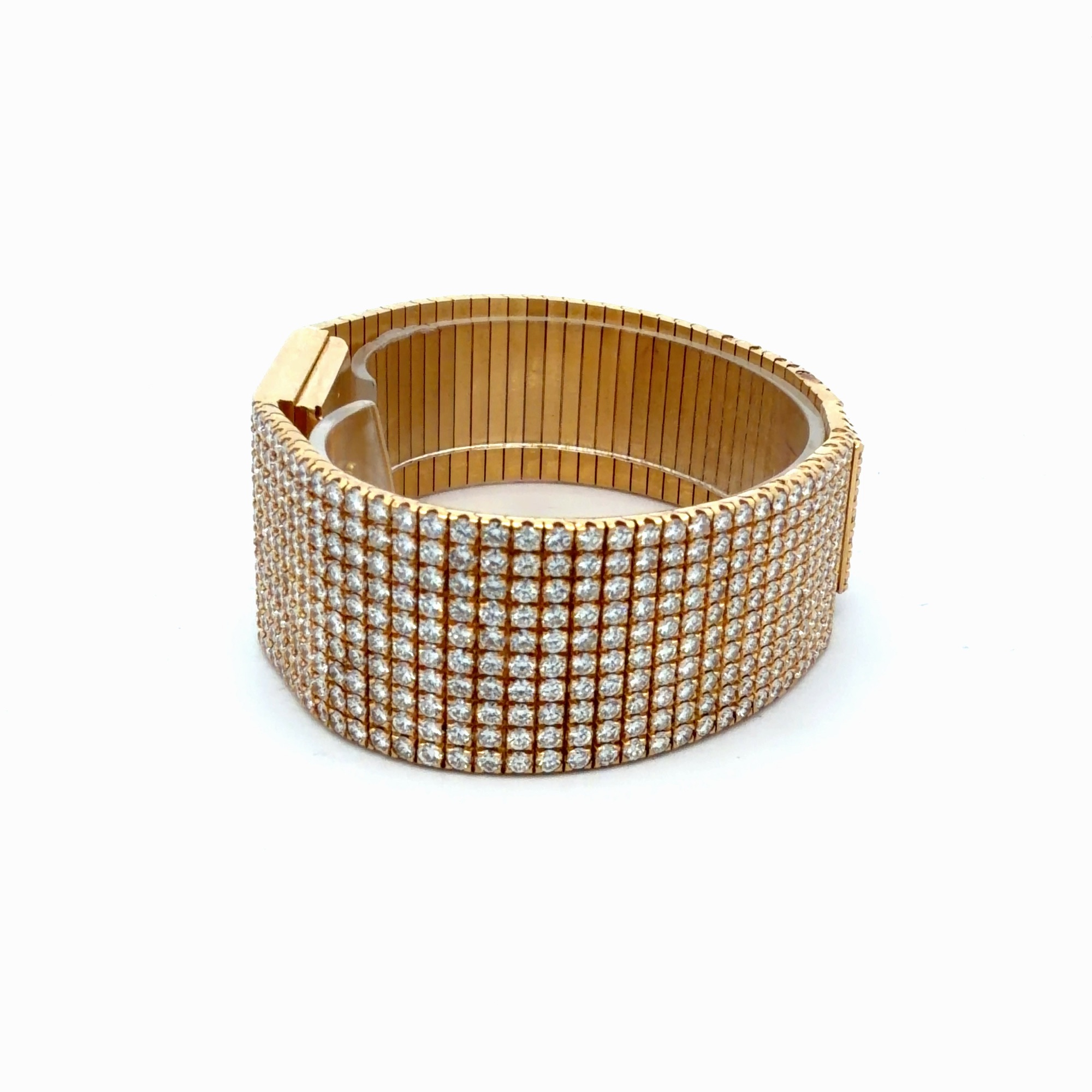 Piaget Ref. 7131 C626 Factory Diamond 18K Yellow Gold High Jewelry Cuff Watch – side profile showing crown